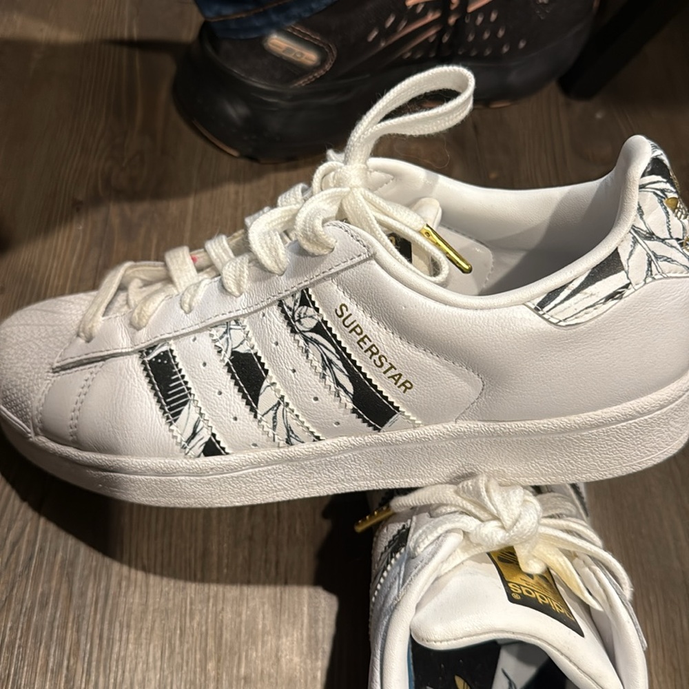 Adidas White and Black Superstar Sneakers with Iconic Shell Toe